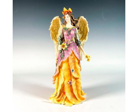 First edition produced in a limited edition, hand-crafted cold-cast resin fairy figurine wearing a dress in the shape of long