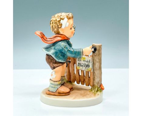 Hummel porcelain figure featuring boy going to the doctor with bandages all over. Goebel backstamp TM8. M. I. Hummel impresse