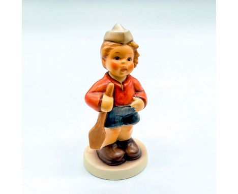 Hand painted boy with red shirt, oar and sailor's cap. Goebel backstamp. Impressed mark 2148. Issued: 2002Dimensions: 3.75"H 