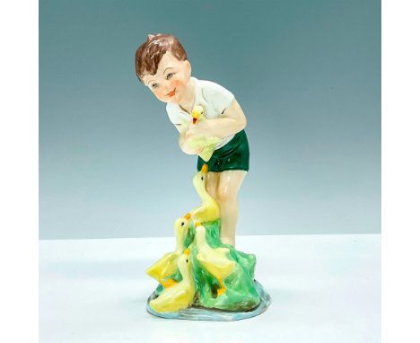 Modeled by F.G. Doughty and crafted by Royal Worcester, this porcelain figurine depicts Johnny with happy ducks. Royal Worces