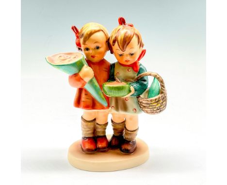 Matte finished, hand painted little girls carrying basket, flowers and food. Goebel backstamp. Hummel impressed mark. 52. Iss