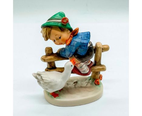 Hand painted boy climbing a fence next to a goose. Goebel backstamp. Impress 195. Issued: 2005Dimensions: 4"L x 2"W x 4"HManu