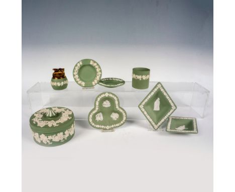 An elegant collection comprising a powder jar, lighter, 2 ashtrays, a small cup, and 3 jewelry dishes in spade and diamond sh