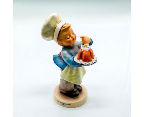 Hand painted boy with chef's hat holding a cake. Goebel backstamp. Impressed mark 128. Issued: 1998Dimensions: 3"L x 2.25"W x