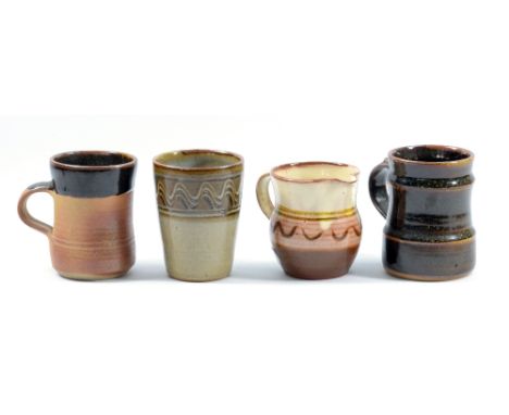 DON JONES (1936-2019) for Winchcombe Pottery; a small slipware jug, impressed DG and pottery marks, height 9cm, two Winchcomb