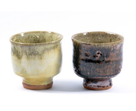 JIM MALONE (born 1946); two stoneware yunomi, one with tenmoku glaze, one with granite glaze, impressed JM and L for Lessonha