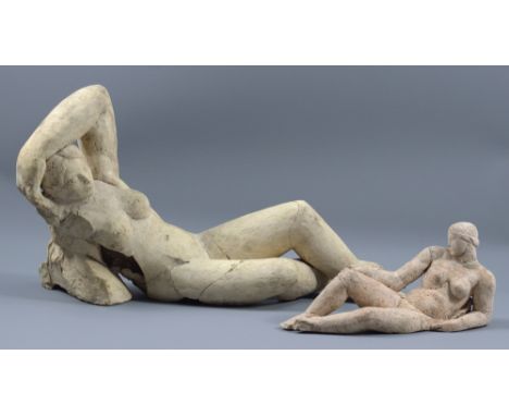 JOHN STORRS (1885-1956); a stoneware sculpture of a reclining female nude, impressed name, length 44cm, and a smaller similar
