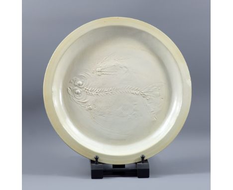 ROBERT GRUNDY (born 1938); a porcelain charger with impressed fossil decoration, diameter 38.5cm.

Made for Grundy's degree s