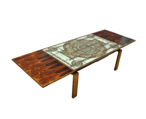 OX ART; a rosewood veneered drawer leaf coffee table with tile top, signed and dated '78, dimensions of top 105.5 x 64.5cm.Ad