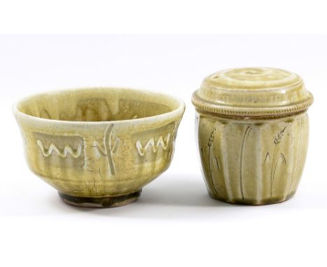 MIKE DODD (born 1943); a stoneware bowl and caddy both covered in green ash glaze with incised decoration, incised MJD marks,