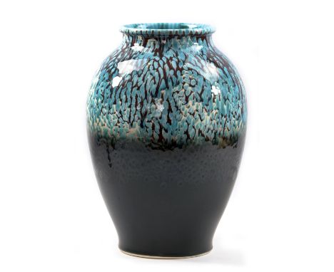 JANICE TCHALENKO (1942-2018) for Poole Pottery; a stoneware vase, turquoise decoration on a black ground, painted signature a