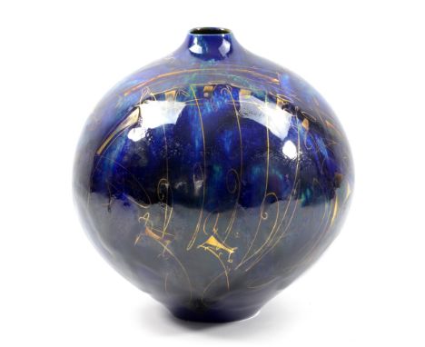 GREG DALY (born 1954); a stoneware globular vase covered in lustrous dark blue and turquoise glaze with gilt decoration, pain