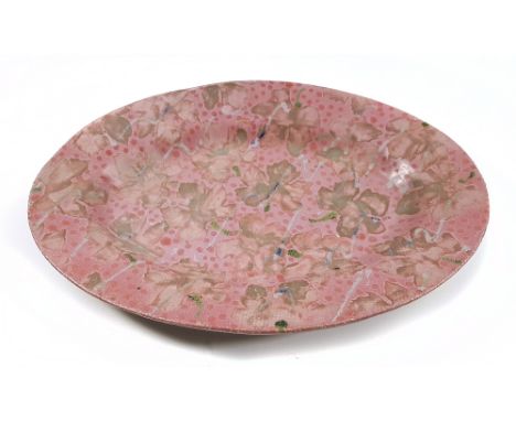 JANICE TCHALENKO (1942-2018); an oval stoneware dish decorated with leaf pattern on a rose ground, length 41.5cm. (D)Addition