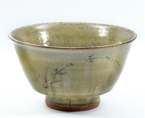 JIM MALONE (born 1946); a stoneware footed bowl covered in green ash glaze with incised grass decoration, impressed JM and L 