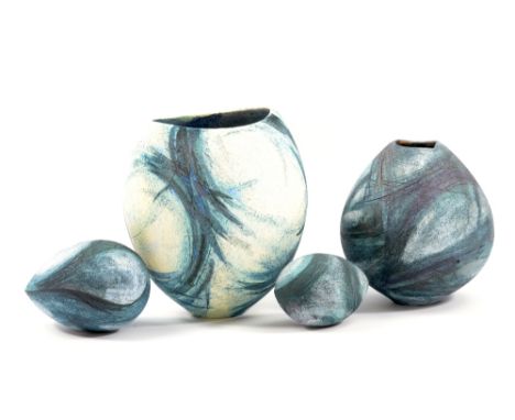 KATIE BRAIDA; two bulbous vessels with blue curves on white, tallest 16.5cm, and two matching pebbles (4).&nbsp;(D)

Provenan