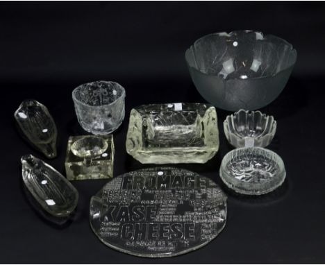 BENGT EDENFALK FOR SKRUF; a clear glass typographic cheese platter, diameter 30.5cm, and further tableware comprising a large