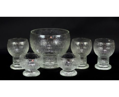 TIMO SARPANEVA FOR IITTALA; six pieces of 'Kekkerit' pattern clear glass tableware comprising bowl, diameter 19.2cm, a pair o