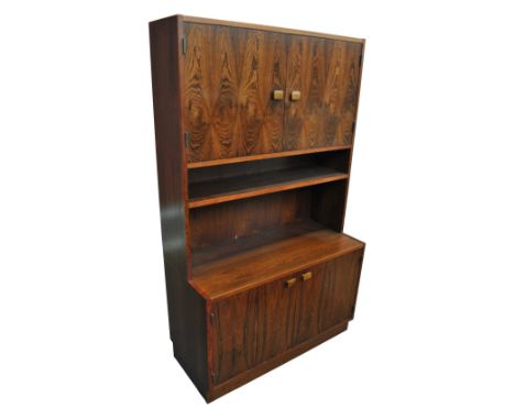 A circa 1970s Scandinavian rosewood veneered dresser, with twin cupboard doors above a shelf and further doors to the base, w