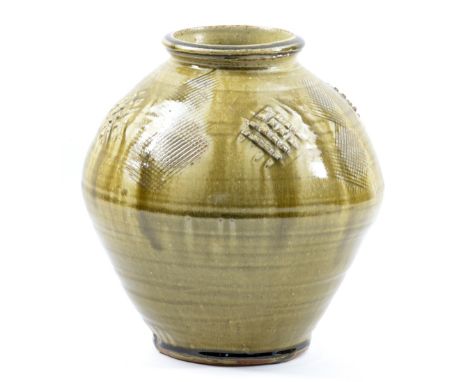 MIKE DODD (born 1943); a stoneware vase covered in green ash glaze with incised and impressed decoration, incised MJD mark, h