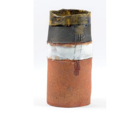 ROBIN WELCH (born 1936); an oval stoneware vessel with bands of gold, black and white glaze and incised meander pattern with 