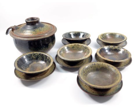 ABDO NAGI (1941-2001); a stoneware soup tureen with ladle and six soup bowls and saucers, mottled and streaky blue and khaki 