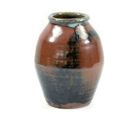 TREVOR CORSER (1938-2015) for Leach Pottery; a stoneware vase with collared rim covered in tenmoku and khaki glaze, impressed