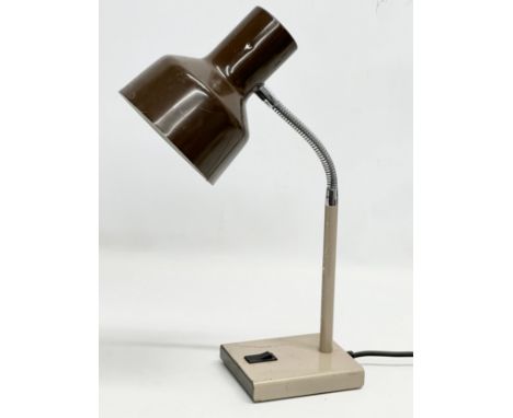 A Mid Century gooseneck desk lamp by The Anglepoise Lighting Company. Model 99. 