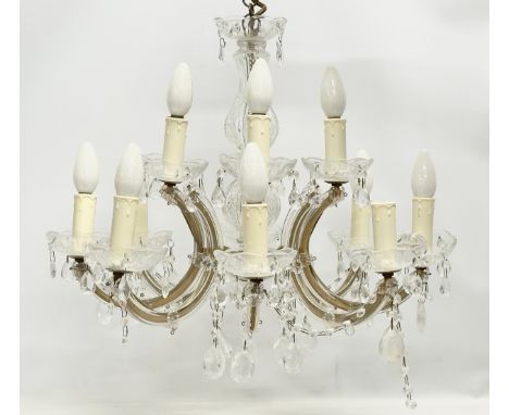 A vintage glass and plastic chandelier. 55x41cm 