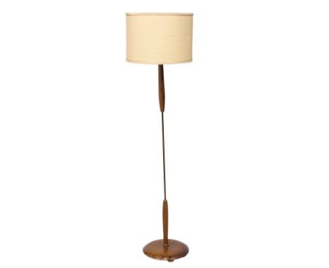 A Mid Century teak standard lamp. 165cm 