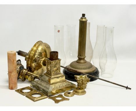 A quantity of Victorian oil lamp parts. 