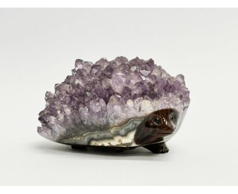 An amethyst and glass hedgehog. 8.5x6cm 