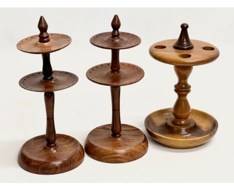 3 turned wooden stands. A pair of 2 tier Indian rosewood earring stands/pin stands. A turned yew wood pipe stand. 24cm 