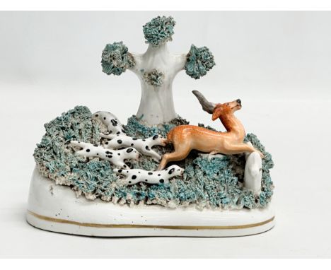 A 19th Century Staffordshire Pottery ‘Stag Hunting’ ornament. 15.5x8.5x13cm. 