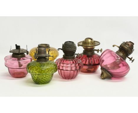 A quantity of Victorian glass oil lamp bowls. 