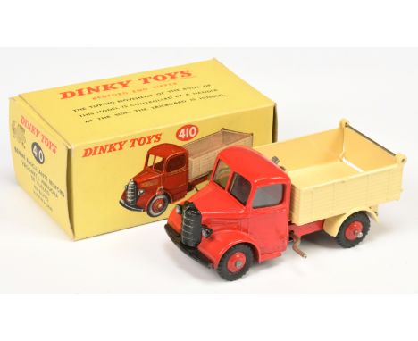 Dinky Toys 410 Bedford End Tipper - red cab and rigid hubs, cream back and with windows - Excellent (some very light pitting)