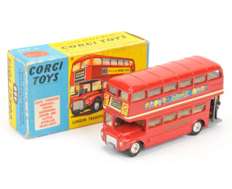 Corgi Toys 468 "London Transport" Routemaster Bus "Outspan" - Red body, cream interior, yellow stairs, spun hubs and silver t