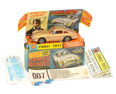 Corgi 261 "James Bond" Aston Martin DB5 taken from the film "Goldfinger" - gold, red interior with "James Bond &amp;Bandit" f