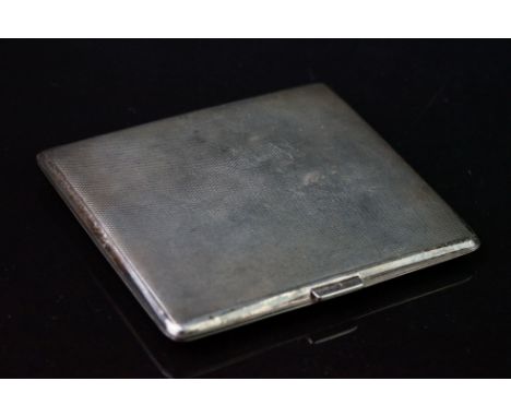 Silver cigarette case, rectangular engine turned design, gilt interior with presentation inscription, makers William Suckling