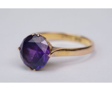 Amethyst 18ct yellow gold ring, the round mixed cut amethyst diameter approx 10mm, claw setting, ring size Q 