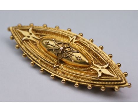 Victorian Etruscan style 15ct yellow gold brooch, the marquise-shaped brooch with granulation and and repeating pattern decor