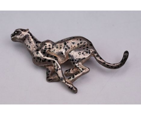 Silver brooch modelled as a running cheetah, black enamel spots, makers mark possibly HG, hallmarked London 1981, length appr