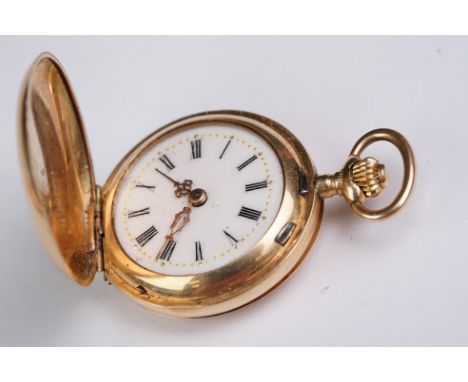 Full hunter top wind 14ct yellow gold fob watch, plain polished case, white enamel dial, black Roman numerals, gilt fancy pie