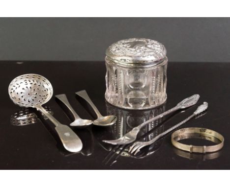 Silver topped cut glass dressing table pot, a white metal pickle fork, two Georgian silver teaspoons, a silver sugar sifter s