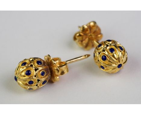 Pair of enamelled 18ct yellow gold stud earrings, small blue enamel dots to the sphere head, post and butterfly ear fittings 