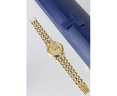 A gents Tissot 1853 dress watch with date window to 3 o'clock position, Tissot logo to crown, 18ct gold watch case together w