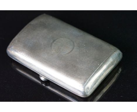 Late Victorian silver cigarette case, curved form, engine turned decoration, blank circular cartouche, makers mark partially 