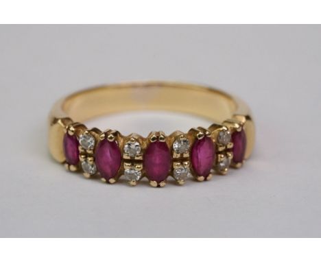 Ruby and diamond unmarked yellow gold half eternity ring, five marquise mixed cut rubies with eight small round brilliant cut