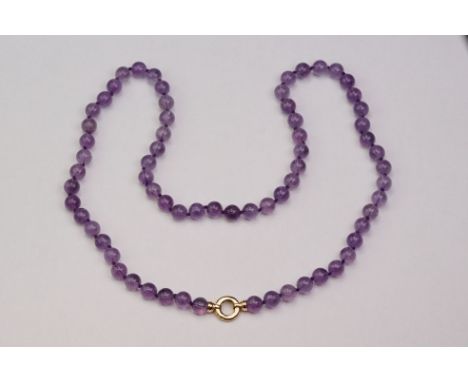 Amethyst bead necklace with 18ct yellow gold bolt ring style clasp, comprising sixty-eight amethyst beads, length approx 76cm