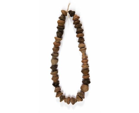 Pre-Columbian Nayarit Culture spindle whorl bead necklace, Ecuador, 300 BC -  300 AD.A restrung necklace of ceramic beads in 