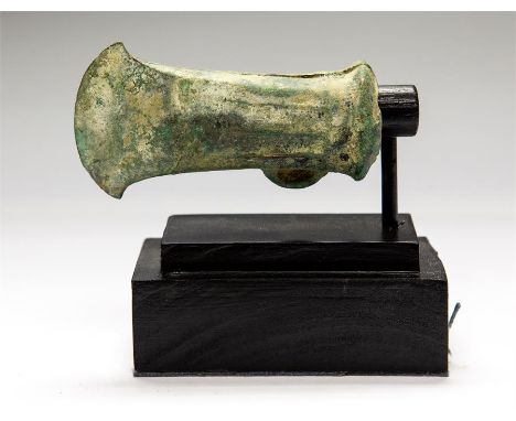 Bronze Age Socketed Axehead, 1st millennium BC  A bronze axehead, with flared blade, fluted body and loop to the side of the 